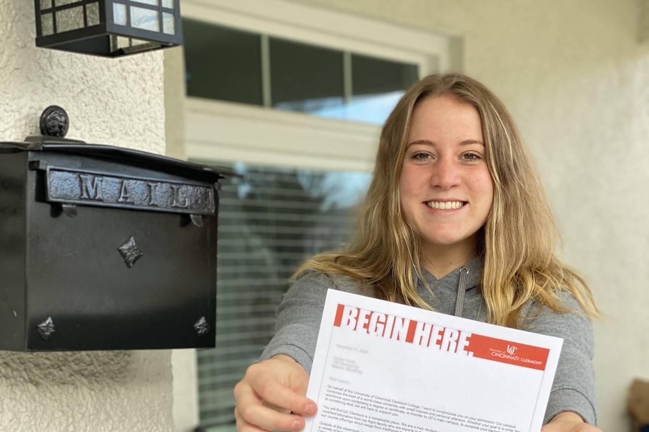 Student with acceptance letter